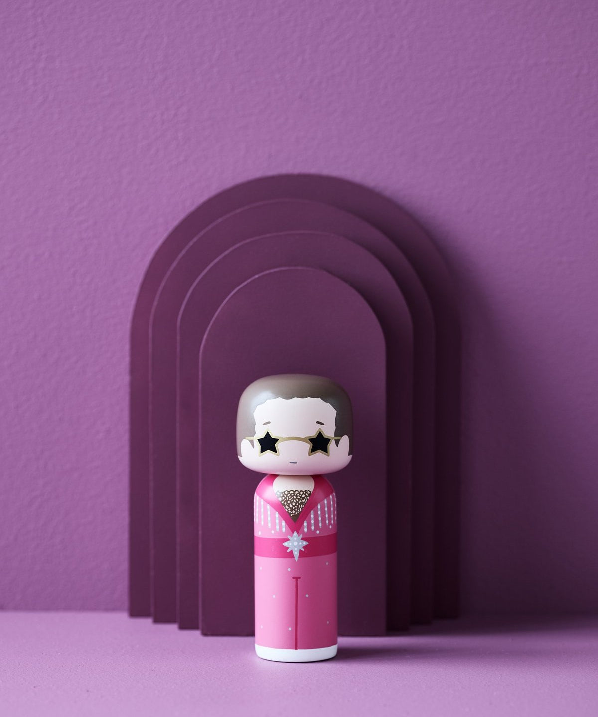 Elton John in pink Doll